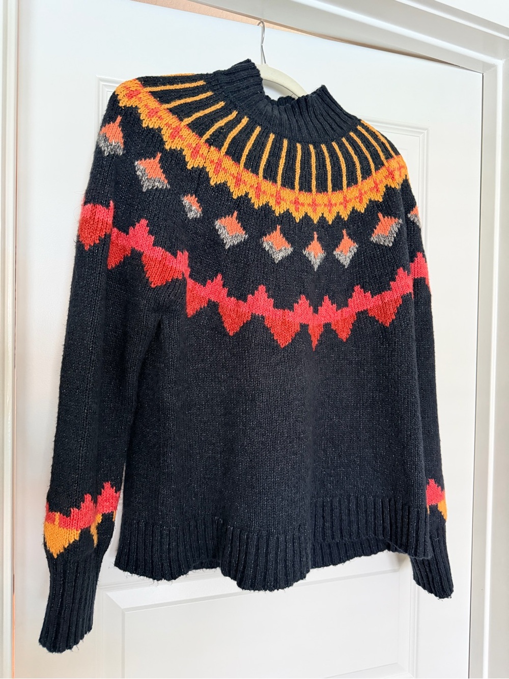 Tribal Black Turtleneck Sweater with Red and Orange Fair Isle Accents